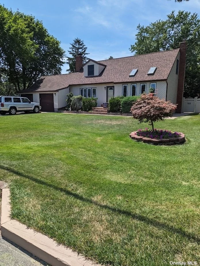 Welcome to this Beautiful 3 Bedroom 2 Full Bath Cape in Beautiful neighborhood in Bohemia. Close to park and hi school. 1st floor wood floors, Laundry/mudroom 1st floor. Home consists of Livingroom, dining room, Family room with wood burning fireplace, Large eat in kitchen with island and computer/work area. Large primary bedroom with walk in closet. Large deck with overhang off kitchen. 2 car attached garage. full finished basement outside entrance. Large fenced landscaped yard with inground sprinklers. Make this your next Home. Burner & Hw Heater 5yrs old.