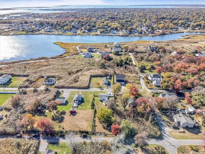 Great opportunity near stunning views. This fully cleared lot is conveniently located near Smith Point Beach and shopping centers, with quick access to the main road. Enjoy the perfect balance proximity to amenities and the serenity of a peaceful area. Don&rsquo;t miss your chance to transform this land into your ideal oasis!