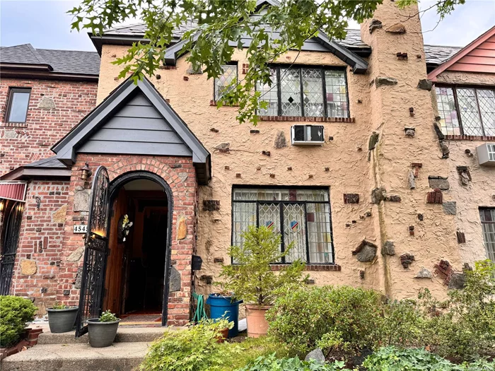 Beautiful English Tudor One Family (could be Easily used as Mother-Daughter ) In the Most Desirable Places Neighborhood In Queens. Definitely Dimond Move-In Condition! Close To Transportation(a Block away from Northern Blvd, Buses are directly to Flushing Main Street) Schools, Shopping & Highways. House are updated with Andersen Windows, Beautiful Bathrooms, Wood Floors Throughout. Has Garage In the back, Enjoyable Deck above the garage. Basement with outside separately Entrance, Large nearly New Updated Bathroom With Stall Shower, Separate Bathtub & Access From Master Bdrm And Hallway...and Much More...