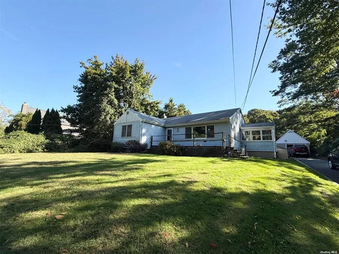 This cozy mother-daughter house sits on approximately 1.1 acres of land in in the quite little town of Northport. The first-floor features a large eat-in kitchen with a washer and dryer set-up. There&rsquo;s a door in the kitchen that leads to the mudroom and back deck. The front deck and door of the house open up to a spacious living room with plenty of windows for natural lighting. There&rsquo;s three bedrooms and one full bathroom. The basement is finished and set up as a legal one-bedroom apartment with a large living room, bedroom, a full bath and a good-sized kitchen, lots of closet space and a washer and dryer. There&rsquo;s a one car garage at the end of the driveway. It&rsquo;s hard to explain the beauty of the land surrounding this house. It&rsquo;s a must see.