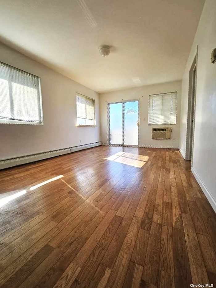 Discover this charming 3-bedroom, 2-bathroom (with Parking) residence nestled in a vibrant neighborhood in Flushing, Queens. Conveniently located near parks (Kissena Park), restaurants, and easy access to public transportation (Q65, Q27, Q12, Q13, Q31 and LIRR bus lines), this newly renovated unit features Hardwood Floors throughout the apartment, Newly Renovated Modern Kitchen, Private Balcony and Two Full Bathrooms ! This well-maintained apartment in Flushing is the perfect opportunity to enjoy city living in a residential setting.