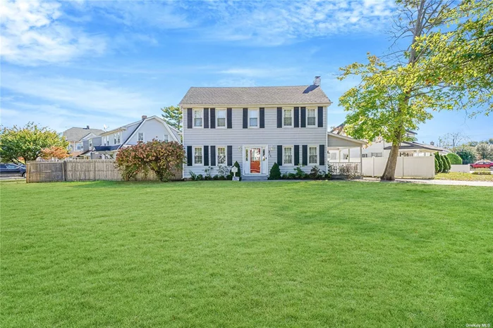 Welcome to this charming 4-bedroom, 2-bath center hall colonial, perfectly situated on a spacious 95x95 corner lot. As you step inside, you&rsquo;ll be greeted by a center hall with half bath, bright and inviting eat-in kitchen, with ample windows that flood the space with natural sunlight. The cozy living room features a wood-burning fireplace, making it an ideal spot for family gatherings and relaxation. With an additional space perfect for a home office. Each of the nicely sized bedrooms offers plenty of space for comfort and versatility, while the finished basement, complete with an outside entrance, provides additional living or storage options. Enjoy the outdoor space on the generous lot, perfect for entertaining or play. This home combines classic charm with modern functionality, making it a must-see! !!!!!!!MUST REMOVE SHOES OR COVER THEM!!!!!!!