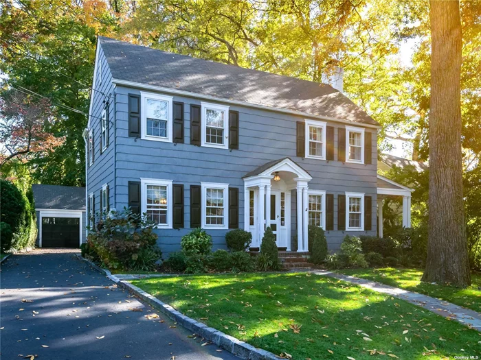 This beautiful center-hall Colonial, located in the heart of Munsey Park, offers timeless charm and modern convenience. Featuring 3 spacious bedrooms and 2 full baths, the home provides comfortable living with a generous living room, an open kitchen flowing into the family room, and a side porch perfect for relaxing. The large backyard offers additional space for outdoor enjoyment. Its prime location provides ideal convenience for walking to the train station, downtown Manhasset, and Munsey Park Elementary School.