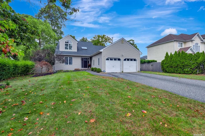 Amazing home situated in the Holiday Beach section of Center Moriches! Enjoy private beach rights (approx. $175.00 per year) and the ability to join the elective HOA (approx. $205.00 per year). Features include Newer Roof (3-4 years old), New Heating System (2-3 yrs old), CAC 2-zone, Andersen Windows, New 330 gallon Oil tank & New Hot Water Heater. Spacious home with 2100 square feet includes Large LR with Wood burning insert Fireplace with beautiful Wood mantle,  Formal DR, EIK w/Bertazzoni Gas Oven Range, Center Island & Quartz Countertops. Home is complete with Full Basement, 2-Car garage and fenced yard! Easy access to Restaurants, local breweries, shopping, Beaches and Marina&rsquo;s.