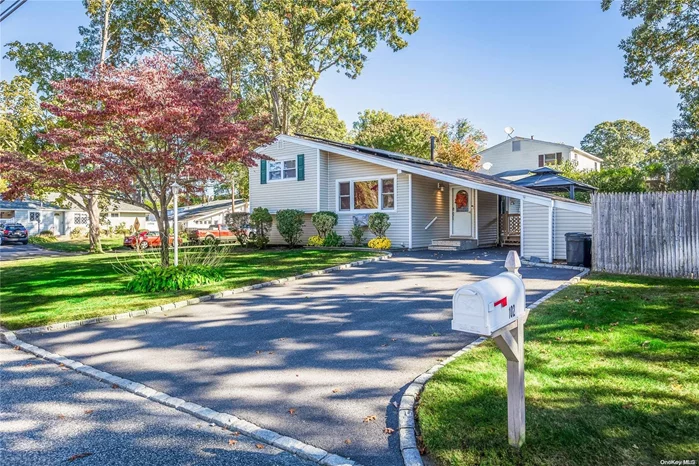 Welcome to 102 Monty Rd, a beautifully updated split-level home in the heart of Centereach, offering 3 to 4 bedrooms and 2 full bathrooms. The open eat-in kitchen provides seamless access to a spacious covered deck and charming gazebo, perfect for outdoor entertaining. Hardwood floors run throughout, adding warmth and character to every room. Enjoy the convenience of central air conditioning and smart home features, including a smart thermostat. The finished full basement offers additional living space, with two large walk-in closets for ample storage. The property also includes a laundry room and a driveway with a covered carport featuring built-in storage. Recent updates include a new glass slider, lower-level windows, hot water heater, furnace, and CAC, ensuring a modern and comfortable living experience. With two cesspools, this home is truly move-in ready!