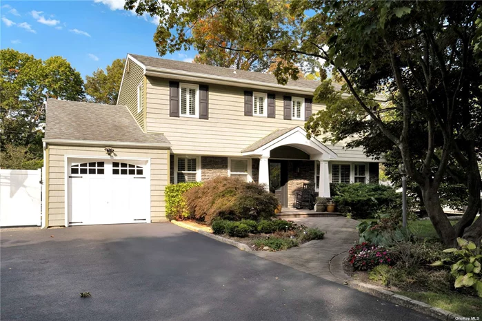 Welcome home! This is the one you have been looking for! Beautifully updated 4 bedroom colonial on a .33 acre, corner property in the heart of the Tulipwood section of Commack. Relax on the porch before you step into your Ah-Ha moment and cozy up by the woodburning fireplace in the den. Then enjoy cooking your gourmet meal in the state of the art kitchen and serving it in your beautiful dining room. The living room is large and has French doors leading to the patio. The primary bedroom has an ensuite dressing area and full bathroom. The other bedrooms are nice sizes and the main bath has been updated nicely also. The basement is finished and offers a playroom and storage. The star of the show is the yard! The in-ground pool was put in in 2018 and is heated and salt water. The Hot Tub is 1 year old and a real treat! There is a gazebo for those hot summer days or a rainy day. This is truly the house you have been looking for! The chimney was repointed and has new stainless liner. The oil tank is above ground in the basement and is brand new. Burner 2019, CAC 1 year with 1 zone (nest) - Smart House! Cesspool 2013 (2), Sprinkler System 6 Zone with Bluetooth. Roof, Siding, Windows all 2017! Washer and Dryer 2018. Generator Hook-Up. Freezer and Shed (2Years) outside. 4 Video cameras outside. Won&rsquo;t Last!