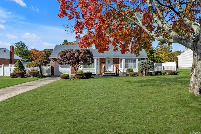 Welcome to this lovely expanded Cape, beautifully maintained by the original owner. The charming exterior featuring two 10 ft bay windows is matched by the warm and inviting interior featuring hardwood floors throughout. A large living room and dining room abuts the spacious eat-in kitchen. The first floor also includes a master bedroom, 2nd bedroom and full bath. A bright and sunny sunporch with wood burning stove offers an additional space to relax and unwind year round. Two oversize bedrooms and a large full bath complete the second floor. Gas heat and central air and add efficency and value. Basement features both additional living space and ample storage. Mid-block location, quiet street and low taxes is an ideal combination for any buyer! Commack SD, Smithtown taxes. Easy show!