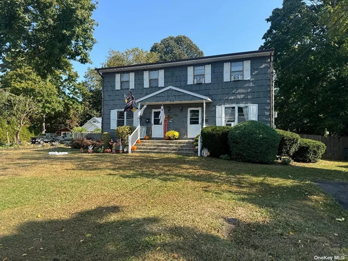 Spacious Sunlit Duplex , Hardwood Floors , Deck overlooks Private Yard .Shared Basement with Storage and Washer/Dryer