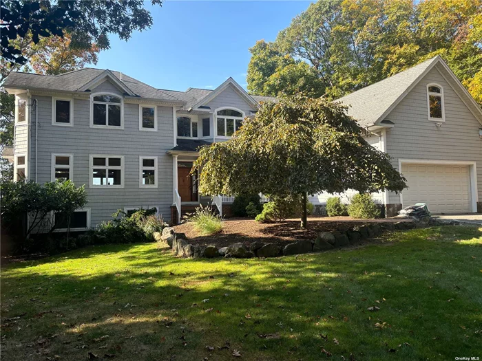 2.5 Acre Water front Flax Pond and Long Island Sound. Custom Build Colonial with 3 fire places, open loft, office, bedrooms, library and much more.