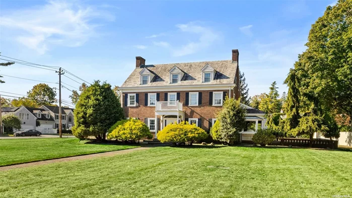 Welcome to this majestic center hall brick colonial, perfectly set in the heart of Cathedral Gardens. The home is a stone throw away from the Garden City border. A welcoming and grand entry foyer leads you to an oversized formal living room with hard wood floors and a beautiful wood burning fireplace surrounded by built in bookcases and other interesting architectural details. Off the living room you will find a bright sun room with walls of glass overlooking the manicured yard. French doors on the opposite side of the foyer, lead you to a banquet sized dining room perfect for all gatherings. The massive eat in kitchen is ready for your own personal touches. The grand front and back staircases gives you access to 6 nice size bedrooms including an ensuite primary with ample closet spaces. Three additional bedrooms and a large hall bath complete the second floor. The grand staircase continues to the third floor offering two additional large bedrooms and another large hall bath. The lower level houses the laundry, components and features a large recreation area with a wood burning fireplace. Bilco doors lead to an expansive patio overlooking the tremendous manicured yard. The home is set on .73 of an acre with room for a pool, and is believed to be sub-dividable but buyer must verify such with the village. Bring you buyers and investors to view the endless possibilties awaiting in this magnificent home