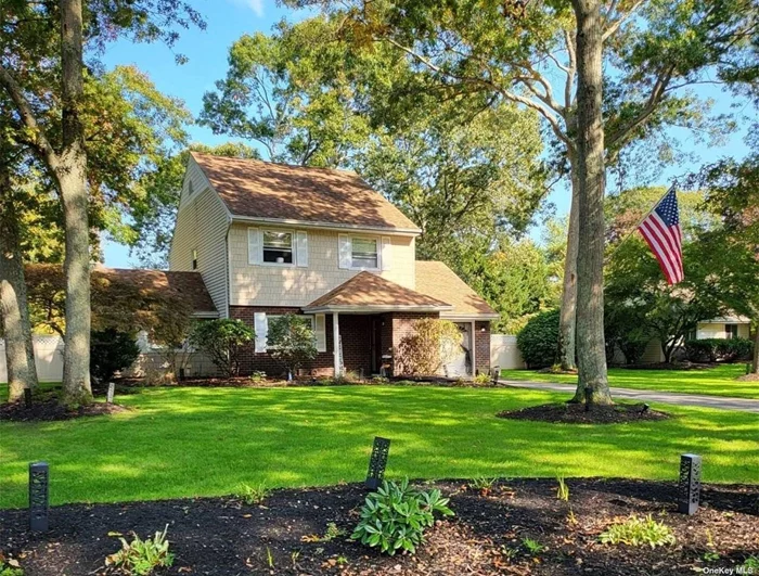 This Sweet Colonial Sits Beneath Towering Trees on a Private Cul-De-Sac. Open Concept Design! Kitchen with All New Stainless Appliances and Granite Countertops. Spacious Den or Playroom and Entertainment Sized Dining Room. The Primary Bedroom has a Walk In Closet and Bath. Fresh Paint Throughout and Updated Flooring. Natural Gas Heat and Hot Water, Central A/C. The Park Like Yard is Just Shy 1/2 Acre with 6 Zone In Ground Sprinklers and is Fenced for Privacy. Easy Commute to NYC with Ronkonkoma Train Hub nearby and Easy Access to LIE for Auto Commuters. Just Move In and Enjoy Your Forever Home!