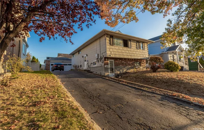 Excellent 2 family Hi Ranch Style Home in a tree-lined street in New Hyde Park, featuring 5 Bedrooms, 3 Full Bathrooms, Living/Dining, Kitchens, a pvt Driveway and a detached Garage. Conveniently located near Jericho Tpke, Close to School, Park, Shops, and other community amenities. Excellent Location! Don&rsquo;t Miss Out!!