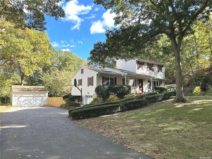 Nestled In The Sought-After Pines Section Of Smithtown And Located Within The Hauppauge School District, This Raised Farm Ranch Offers Both Style And Comfort On Over A 3/4 Acre Property That Backs Up To A Serene Park For Ultimate Privacy. Step Into An Inviting Layout Featuring 3 Spacious Bedrooms, Including 1 Conveniently Located On The First Floor With A Full Bathroom And 2 On The Second Floor With Large Closets, Along With A Second Full Bathrooms. The Main Level Boasts A Large Eat-In Kitchen With A Center Island, A Skylight, Gleaming Granite Countertops, And Stainless Steel Appliances, Perfect For Entertaining And Daily Family Life. Enjoy A Formal Living Room With A Fireplace For Comfortable Gatherings With Guests As Well As A Cozy Family Room Which Includes An Additional Area For An Office Or Creative Space. There&rsquo;s A Versatile Sitting Area Upstairs, And A Full Walk-Out Basement Complete With Sliders Leading To A Fenced Yard. The Basement Also Includes A Laundry Room, Ample Storage Space, Utilities, And Access To The Attached One-Car Garage. An Additional Detached Two-Car Garage And A Very Large Driveway Provide Extra Parking And Storage Options. Outdoor Amenities Abound, Including An Inviting In-Ground Pool With A Brand-New Liner, An Expansive Backyard Deck For Gatherings, And A Charming Front Porch. Additional Highlights Include Central Air Conditioning, Three Heating Zones, In-Ground Sprinklers, And A Fully Fenced Yard. This Well-Maintained Property Offers The Best Of Suburban Tranquility With Easy Access To Nearby Parks And All The Amenities Smithtown Has To Offer. Don&rsquo;t Miss The Chance To Make This Exceptional Home Your Own!