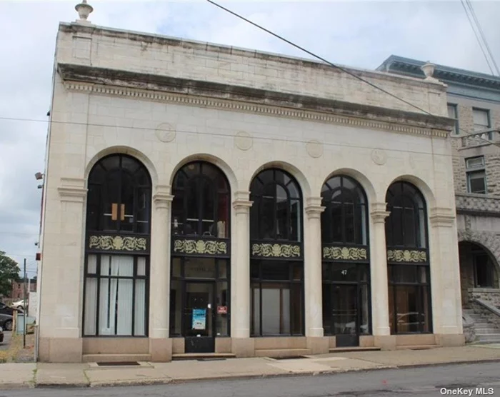 A truly unique opportunity to secure this former bank which contains Soaring Ceiling Heights complemented by its Marble and Granite interior. Located in Newburgh City&rsquo;s Liberty/Grand Street Heritage Corridor. Current configuration provides for 17 offices, 1 Conference Room, Kitchen and a 2nd Floor Balcony overlooking Grand Street.  There is a Full Basement suitable for storage. Designated parking on the corner of Grand Street & Broadway. Walkable to Restaurants, City Hall, SUNY Orange Community College. Also available for Rent at $25sf