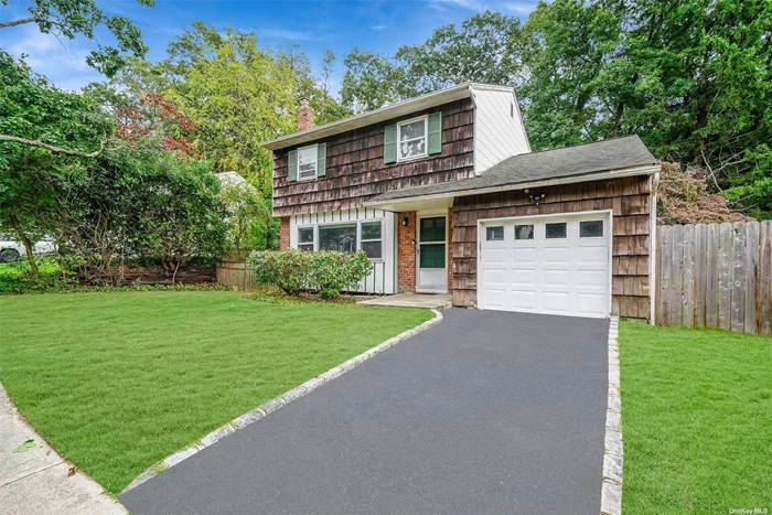 Welcome to this charming Colonial-style home, nestled in the desirable Maplewood section of Huntington Station, situated on a quiet cul-de-sac. With 3 spacious bedrooms and a bright, sun-filled interior, this home exudes warmth and comfort. The main floor features a welcoming living room, formal dining room, eat-in kitchen, powder room, and cozy family room-perfect for both everyday living and entertaining. Upstairs, you&rsquo;ll find a generous primary bedroom, a full bathroom, and two additional bedrooms. Step outside to your private oasis with a decorative paver patio and firepit area, ideal for relaxing or hosting guests. The home also includes hardwood flooring, an attached garage, private driveway, gas heat, and a full basement with high ceilings offering storage or potential for more. Conveniently located near amenities and with easy highway access, this home offers the perfect blend of tranquility and accessibility.