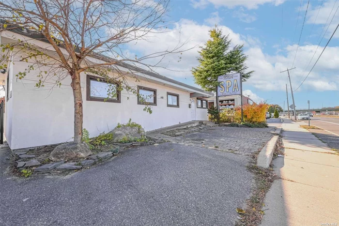 Opportunity to Own a Great Commercial Property in West Babylon! Located in the E Business Zone area, this multi purpose commercial property is suitable for use as an office or for a variety of purposes with a big private parking space. It has a 1140 sqft interior featuring a large front lobby, Nine rooms, Two bathrooms, and a Kitchen/ Laundry. Situated on the service road of Sunrise Highway, adjacent to a residential apartment complex. Ideal for a Law office, medical office, Real estate office, Insurance office, Mortgage office, professional office, Spa, nail salon, skincare business, liquor store, Drug store, Minimart, etc. The Prospective buyers should re-verify all information independently.