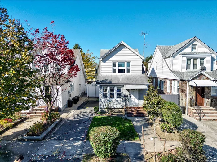 Fall in love with this charming 3-bedroom, 1-bathroom home located in the heart of desirable Forest Hills. An amazing opportunity to call a piece of this beautiful block your home. Step into the freshly painted bright and airy living room that flows seamlessly into the dining area. The cozy kitchen allows for a small table or breakfast nook and features a large sink with pantry and convenient backdoor access to the yard. Upstairs features three well-appointed bedrooms that offer comfort and tranquility, each with great closet space and plenty of natural light. Enjoy the lovely backyard, perfect for entertaining or unwinding after a long day. Newly gated for extra privacy and pets. Private driveway - never worry about parking! This special home also has an unfinished basement, attic, and detached 1-car garage for plenty of storage, a coveted bonus in NYC living. This is truly a prime location - situated in a vibrant community, within walking distance to parks, shopping, and dining. Easy access to public transportation makes this is a commuter&rsquo;s dream. Move right in. Don&rsquo;t miss the opportunity to own this incredible property.