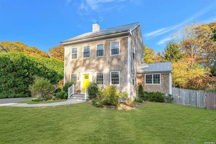 Introducing a stunning custom-built Colonial that seamlessly blends historic charm with modern comfort. This home features a chef&rsquo;s kitchen boasting quartz countertops, a super white quartzite island, and a 36 Blue Star range. Adjacent you will find a light-filled den with windows on three sides adjoining a full bath with pedestal tub. The dining area offers cathedral ceilings and French doors that lead to a serene patio, perfect for entertaining. Upstairs, you&rsquo;ll find four bedrooms, one full bath with antique reproduction clawfoot tub, laundry closet, and a large walkable attic with insulated rafters for storage. This home features radiant heat floors throughout, including the partially finished basement with outside entry.  Enjoy the charm of eight over eight Pella windows, a cedar shake exterior, and reclaimed wood floors from a Vermont barn, exuding warmth and timeless character. The property&rsquo;s backyard is a private oasis with mature plantings and a chemical-free lawn. This eco-conscious home is topped with a 50-year standing seam galvanized steel roof, combining sustainability with beauty.  This exceptional home offers a perfect blend of history, comfort, and modern living.