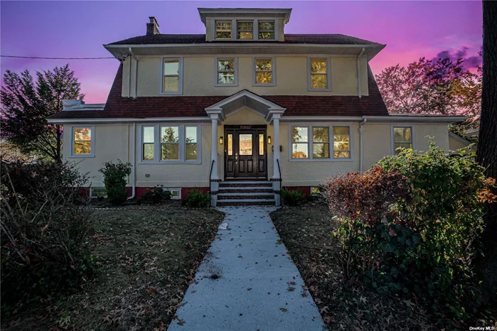 Welcome to this beautifully renovated, almost-like-new two-family home in Flushing, set on a spacious 60x100 lot along a charming tree-lined street. This property features brand-new HVAC systems, chandeliers, split-unit heating and cooling in nearly every room with it&rsquo;s own remote, and new hot water tanks for each unit. Additional highlights include a brand-new roof, all-new windows and screens, and new wood flooring throughout. Enjoy a modern aesthetic with newly installed doors, door handles, and elegant lighting fixtures. With its southwest orientation, this home benefits from abundant sunlight throughout the day, designed to maximize both comfort and functionality. The property also includes a two-car garage with remote-controlled access and a long driveway that can accommodate 4 to 6 vehicles. Upon entering the first-floor apartment, you&rsquo;ll be welcomed by a French door opening into a spacious, bright living room featuring a cozy wood-burning fireplace. The kitchen is a standout, equipped with stainless steel appliances, including a Frigidaire 5-burner gas range, refrigerator, dishwasher, and GE microwave. This level also offers three bedrooms and a full bathroom with a stand-up shower. The second-floor apartment is a duplex that includes two sun-filled bedrooms, a full bathroom, and an eat-in kitchen with stainless steel Frigidaire and GE appliances, along with a convenient hookup for a private washer and dryer. The third floor features two large, bright bedrooms and a powder room. The bright, fully finished basement offers multiple windows, a utility room with a secure metal door, and additional laundry hookup facilities. Don&rsquo;t miss your chance to own this exceptional property, perfect for multi-family living or investment opportunities!