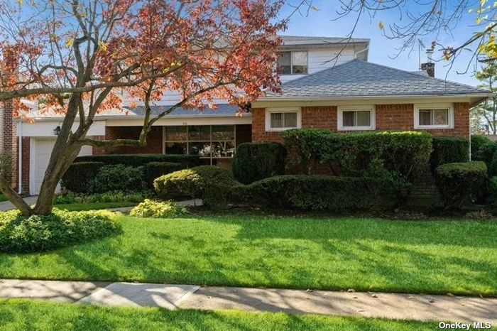 This well maintained 2, 329 square foot, expanded home boasts six/seven bedrooms, three full bathrooms and is located on a picturesque, tree-lined street in Barnum Woods. A welcoming front porch brings you inside to a light-filled interior with large windows and crown molding on the main level. A floor-to-ceiling picture window in the living room brings in lots of natural light that flows into the formal dining room with an additional picture window. With generous white cabinetry and appliances and a large window by the dinette, every detail in the kitchen shines beautifully - the perfect place for gatherings and casual meals. Off the kitchen is an outside entry to a patio overlooking the lushly landscaped back yard as well as a comfortable den/office that can also be used as a guest room. The first floor continues to the primary bedroom with a full en suite bathroom, two additional bedrooms, and full hall bathroom. The second floor has three more good-sized bedrooms, all with ample closets, and a full hall bathroom. The unfinished basement offers a laundry area and plenty of storage space. Beautifully planted front and back yards and an attached tandem 2 car garage complete the home. Updates include heating, hot water heater, oil tank and roof. Move-in ready and ideally located close to the 930-acre Eisenhower Park with golf courses, pool, ball fields, playgrounds and skating rinks. Also many options for stores, eateries and close to major highways and the LIRR making for an easy commute and quick access to South Shore beaches. All the elements needed for a comfortable everyday living.