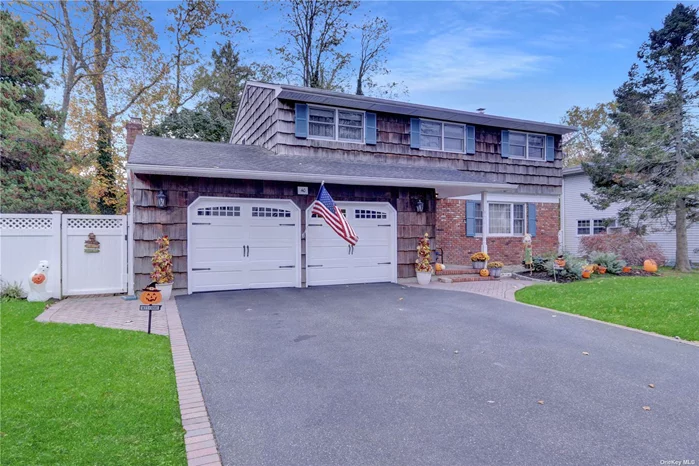 Welcome to this Beautifully Maintained 4 Bedroom 2.5 Bath Colonial Located Minutes from Babylon Village! This Spacious Home has a Sunlit Formal Living Room, Perfectly Placed Formal Dining Room, Updated Eat-In-Kitchen with Quartz Countertops & Solid Wood Cabinets, The Warm, Inviting Family Room with a Wood Burning Fireplace Is Just off The Kitchen! The 2nd Floor has 4 Bedrooms, Including the Primary Bedroom with an En-Suite Bathroom and Walk in Closet and An Additional Renovated Full Bathroom. Additional Features Include In-Ground Sprinklers, 4 Ductless Central Air Units, 4 Zone Gas Heating System, Crown Molding, 200 Amp Electric Service, 10-Year-Old Roof, New Solid Core Interior Doors, Hardwood Floors Throughout, Ceramic Tile in Foyer and Kitchen, PVC Fenced Yard, 2 Car Attached Garage with Remote Door Opening, Front Porch, Back Patio. This is a True Must See!!