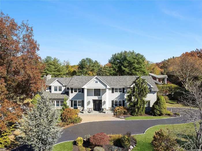 WEST HILLS. Award winning Half Hollow Hills School District. Welcome to this completely renovated home on one of the most beautiful cul-de-sacs in West Hills. A double-height entry welcomes you to this open floor plan with a seamless flow. The eat-in kitchen is the true centerpiece of the home with Cambria Quartz Countertops, Wolf Cooktop, Thermador Double Oven & Sub-Zero Refrigerator. The dining area of the kitchen has a gas fireplace and wet bar.  The first floor also features a Great Room with a gas fireplace and exposed beam ceiling, office with custom built-ins and a large mudroom with radiant heated floors.  Upstairs, the primary suite was completely reimagined with a gas fireplace, custom closet, gym and luxurious bathroom. Three additional bedrooms & 2nd floor media bonus room provide ample space. The 2nd floor also features a glass enclosed indoor endless pool overlooking the media room.  Outside, you will find the meticulously landscaped grounds, featuring an in ground salt water pool and spacious cabana. Outdoor kitchen and fire pit are a dream for entertaining. Property also includes a versatile sport court with basketball hoop.