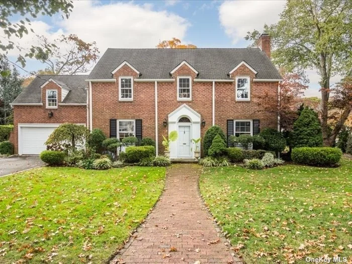 Welcome to 4 Sherwood Road this Brick Center Hall Colonial is located in the Old Canterbury Section of Rockville Centre. This stately home boasts old world charm along with an updated interior. The Entry welcomes you with a beautiful, curved bridal staircase with entry to the Formal Living Room and the Banquet sized Dining Room. The EIK is in the rear of the home featuring, SS Appliances Granite Counter tops and an island with additional seating that flows to the sunlit den with large windows. The upper floor has a King, sized Primary Bedroom w/Bath and WIC. There are an additional 3 bedrooms and full bath as well. The basement is full and finished w/gas Stone Fireplace and Egress Window, Separate Laundry, Storage and Utilities. There is a PVC 2-tiered deck, fenced yard and beautiful, mature landscaping surrounding the grounds. This home also features, Crown Moulding and 5 base throughout, 4-Zone Heat, 3-Zone CAC, Solid Doors, HW Floors throughout and IG Sprinklers.