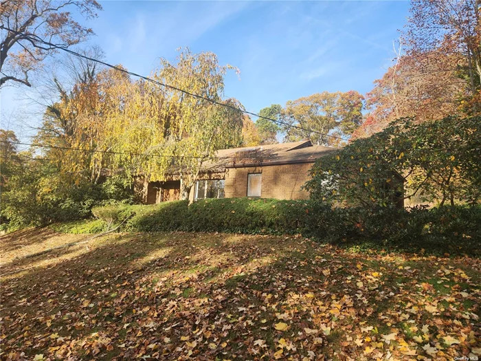 This 5-bedroom 4-bath brick farm ranch exudes a timeless elegance. Its exterior is framed by lush landscaping that adds a touch of natural beauty. Close to the beautiful waters of the town of Oyster Bay, this home offers the ideal blend of countryside serenity and recreational convenience. Situated within easy reach of boating, golf and water sports, it promises endless opportunities for outdoor adventure and relaxation. Stepping inside, you&rsquo;re greeted by an open floor plan that seamlessly connects the living spaces. The spacious living room features a cozy fireplace perfect for entertaining, while large windows flood the room with natural light. The adjacent gourmet kitchen is a chef&rsquo;s dream, boasting granite countertops, high-end appliances, and ample cabinet space for storage. A center island provides the ideal spot for food prep, while a separate dining area offers a more formal setting for meals with family and friends. Sliding glass doors lead from the kitchen to the backyard oasis. A sprawling patio surrounds a sparkling swimming pool, offering the perfect place to soak up the sun. In the master bedroom a luxurious hot tub beckons you to unwind and relax, while a private sauna provides the ultimate indulgence after a long day.