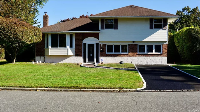 Welcome to this renovated split-level home with Commack School District, With three spacious bedrooms, two bathrooms, and 11 total rooms, this residence offers an open-concept layout perfect for modern living. The home features stunning brand new wood floors throughout, a huge, bright den with sliding door to the back yard, and abundant natural light ( North- South Exposure) streaming through large windows. The kitchen includes modern appliances and opens to a brand-new wooden deck, ideal for seamless indoor-outdoor entertaining. bedrooms and bathrooms are generously sized, while the finished basement has an office and second den with multiple closets which provide excellent storage options. The backyard offering ample sunlight and additional conveniences which includes laundry facilities with a washer and dryer. This home combines style, comfort, and practicality in a fantastic location, close to Shopping Centers and Parks.