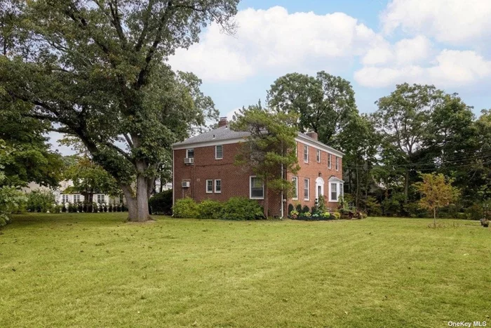 A RARITY!! This 3, 200 sq ft center hall colonial sits on a MASSIVE 20, 000 SQ FT double lot on one of the most desirable streets in Cedarhurst! Originally a builder&rsquo;s home, this solid brick boasts 2 fireplaces, 4 oversized bedrooms & 3 full baths including a large handicap accessible one on the main floor. Kosher EIK with tons of cabinets. Gas heating, partially finished basement, plenty of storage in attic and basement & a detached 2.5 car garage. Around the corner from Cedarhurst Park & walking distance to many houses of worship, shopping, LIRR & bus routes. Situated on a beautiful tree-lined street, this half acre of park-like property has room to expand, put in a pool, or even build a 2nd home! Low taxes & not in a flood zone - this will go quickly!