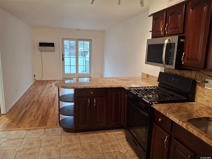 1st Floor Two Bedroom on a quiet block. Renovated Kitchen with big island. Updated Bathroom, Newly finished floors. Use of Spacious Backyard. Rent Includes All utilities except electricity. Great neighbors. Street Parking. No Pets. 3 blocks J & Z train