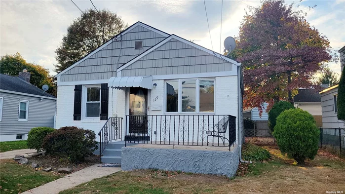 Renovated Ranch, New Eat in Kitchen, Hardwood Flooring, Updated Bathroom, Private Yard, Garage, Front Porch, Close To LIRR, Shopping and Park.