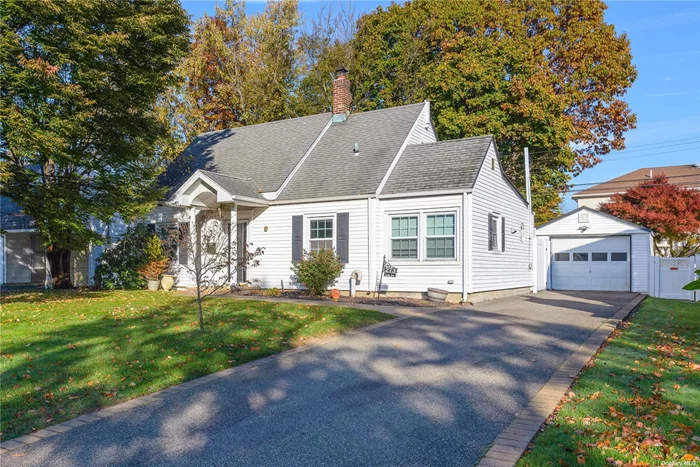 Sunny and bright cape on quiet dead end street in Carle Place schools! Updated eat-in kitchen with pantry closet, tile floors, loads of granite counters, glass cabinet door, beadboard accents, tile backsplash, cathedral ceiling. Two bedrooms down and updated tile bath. Upstairs has two bedrooms and updated and beautiful tiled bath! Great features include, ceiling fans, split duct AC units, covered patio, fenced yard with garden, oversized 1 car garage. Close to everything central Nassau has to offer. LIRR, great shopping, dining, parks and more! Don&rsquo;t miss.