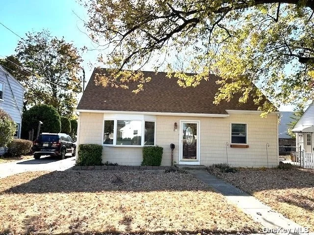 Beautiful Expended Cape 4 bedrooms and 1 bathroom, offers 1592 SQFT of living space, open floor plan, Large Living Room, Kitchen with lots of cabinets, all around counter tops, S.S Appliances, Sun beamed Breakfast Nook/ Dining area, Laundry and boiler room, French door Leading to Back Yard, Harwood Floor 1st Floor, Recessed lightings, Surround Systems throughout the house ready to hook up, 5 Split CAC units, Hydronic hot water tower radiators,  Replaced roof 2021, on Demand hot water heater, 200 Amp Elec. Low Taxes, Near Schools, Parks, Shopping&rsquo;s, Too much to list!! Must see!