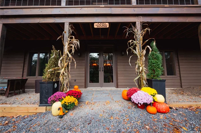 Amazing spacious log home in the heart of the Catskill Mountains. This very successful 2480 sq ft airbnb was built in 2022, sits on 2.2 acres. This Alta Log Home includes 3 cozy bedrooms as well as a huge loft overseeing the great room below and comfortably sleeps 12. The walkout basement boasts a full arcade style game room and 9&rsquo; french doors opening onto the driveway off the private gravel road . The Trex composite deck wraps around the entire house and state of the art Tesla solar panels provide the electric as well as (2) Tesla Power Wall backup battery systems . An above ground propane tank fires up the kitchen stove, outside bbq and gas stove in the basement. The house is being sold fully furnished and ready to continue as an Airbnb including all future bookings and our awesome property manager/ housekeeper is ready to stay and run the business if that&rsquo;s what you want. Or make this your full time home. 5 minutes from downtown Saugerties and Kingston and 30 mins from Hunter Mountain.