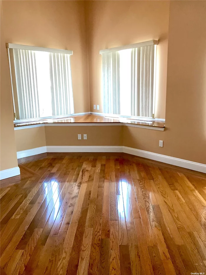 Mint 2 bedroom corner unit with hardwood floors throughout. Sun drenched rooms. Central heat and air conditioning. Separate laundry room. Immaculately maintained property. No pets please.