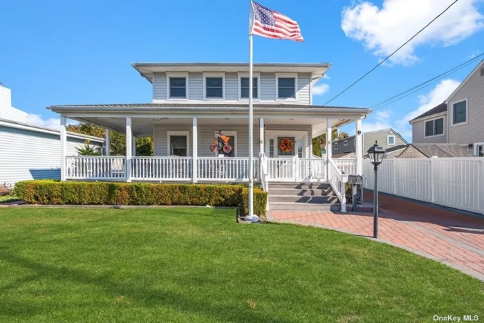 This charming Colonial-style home invites you in with classic appeal, wrap around porch and modern comforts in the interior. Welcome home to 51 1st. Avenue, a custom built home.  Eventually, you&rsquo;ll need to gravitate away from your wrap around front porch. When you do, you are invited to a front office, massive kitchen, butlers pantry, family room, and powder room. Remodeled in classic white and quartz countertops with a marble backsplash. Your massive kitchen was completed in 2016. Soft close cabinetry, double pantries, huge center island with operating drawers gives you plenty of storage. Appliances are all stainless steel with a double oven for your cooking convenience and entertaining needs. To help with the entertaining is the butlers pantry with side entrance. Custom shaker shutters gives an added cozy appeal.   Upstairs, the primary suite is a relaxing retreat, very large in size and features an ensuite bathroom that was remodeled in 2022 and a generous walk-in closet and two additional closets. The two additional bedrooms are well-proportioned, offering plenty of room and closet space. Furthermore, a full bathroom, laundry room and abundant natural light from the skylight.  Though not finished, this basement was not just an add-on. An impressive extension with eight foot ceilings. A true rarity!