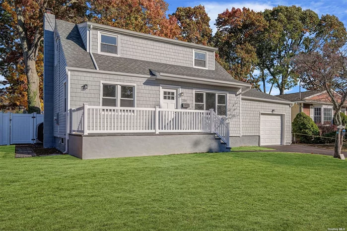 This beautifully renovated double-dormered Cape Cod home is in truly new condition. It is a very spacious home that needs nothing except a new owner to enjoy it. Two new full baths, a new fully equipped Eat In Kitchen, a spacious Family Room and LOW TAX make this a winner. Call now to see it today.