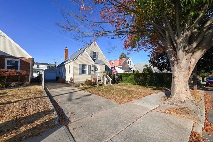 Updated Cape Close To All, Features New Kitchen With Stainless Steel Appliances, Updated Electric, New Gas Heating System and Central Air, Full Finished Basement Perfect For Entertaining, Inviting Backyard With Cement Patio, Updated Roof, Windows, Siding and PVC Fence! Great Home In Move In Condition!