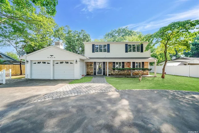 Welcome to this spacious and inviting four bedroom, 2 1/2 bath colonial home in the desirable Middle Country school district. Step inside to find a primary bedroom with en suite bath on the second floor, along with three additional bedrooms and another full bath. The first floor features a living room, dining room, and eat-in kitchen, as well as a laundry room and an extra den - perfect for a home office or playroom. With 2300 square feet of living space, there is plenty of room for everyone. Outside, enjoy the convenience of a two car garage, skylights, and a 1/3 acre of level land. Don&rsquo;t miss out on the opportunity to make this your new home sweet home!