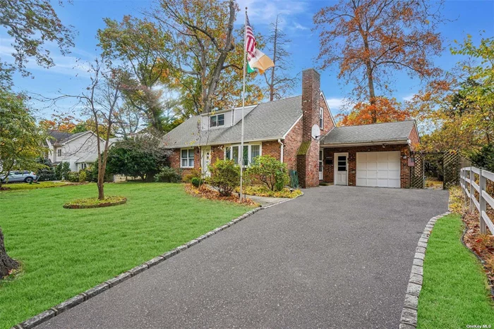 Start each day in your inviting 5-bedroom, 2-bath home where thoughtful spaces blend comfort and charm. The kitchen, with ample cabinetry, counter space, and a peninsula for casual meals, flows into a spacious dining room. French doors lead to a backyard patio, perfect for dining al fresco. The cozy living room, complete with a fireplace, invites quiet mornings with coffee or evenings curled up with a book. Downstairs, a bar area adds a fun hangout spot, while outside, a detached garage and generous yard await. Nestled in a tree-lined neighborhood with easy access to highways and amenities, this home offers a peaceful retreat from the everyday.