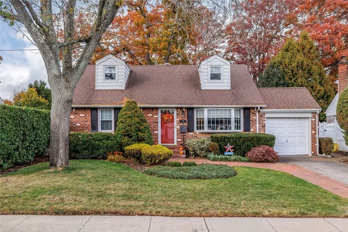 Beautiful Rear Dormered Expanded Cape, Oversized Property 60 x 135, Open Floor Plan, Interchangeable Layout Dining Room or Living Room, Gorgeous Sunfilled Great Room Extension w/Cathedral Ceiling, Skylights , Brand New Sliding Glass Doors leading to oversized backyard with Paver Patio, Fire Pit, Brick Side Patio,  Large Updated Eat-in Kitchen w/Center Island , SS Appliances (Brand New Dishwasher), Finished Basement .. great for entertaining  3 Large Bedrooms, Office & Laundry Room could be a 4th bedroom, New Floors Upstairs,  2 Updated Bathrooms, 150 Amp Serivce, Brand New HW Heater, Alarm System, Mid-block location, Great Curb Appeal.