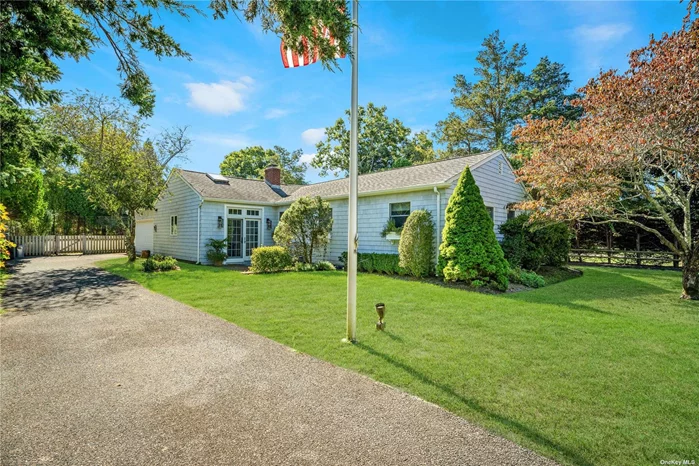 QUOGUE CHARMER Beach House- South of the Highway Adorable three-bedroom two-bath home located south of Quogue Street. This house offers a perfect blend of comfort and ease and outdoor enjoyment. It was recently renovated with a new kitchen & hardwood floors throughout, and doors that open to a very secluded backyard and heated pool. There is a bonus room and attached garage that has potential for expanding. The house is a short distance to Quogue village and minutes to the beach. A perfect beach get away.