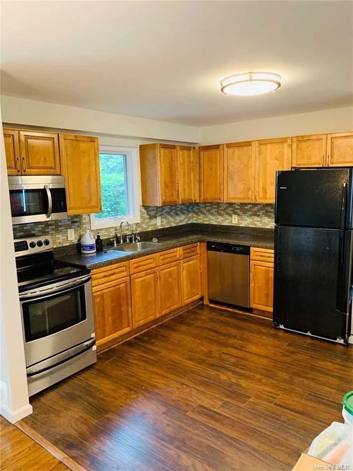 Spacious Bright and Airy 2 Bedroom Apartment With Hardwood Floors Throughout*Open Space Concept Features Living Room*Updated Kitchen*Complete With Washer and Dryer*Close to Great Restaurants*Schools*Shopping*Public Transportation*Great Location!