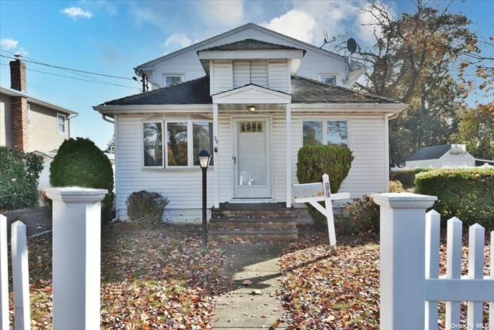 Charming Expanded Ranch Style Home In The Heart Of Farmingdale With Just Over 1, 800 Sqft Of Space And Encompassing 4/5 Bedrooms And 2 Full Baths. Oversized 75&rsquo;x 125&rsquo; Property Includes a Detached Garage With An Extra Long Driveway And Sprawling Backyard With Classic White Picket Fence. An Inviting Front Entry Brings You Inside To A Large Living Room With Lots Of Sunlight And Direct Flow Into A Formal Dining Room Boasting Original Hardwood Floors. Just Beyond Is A Generous Kitchen With Rich Wood Cabinetry, Stainless Steel Appliances, And A Bright Breakfast Nook. There Is A Sunroom With Skylights, Walls Of Windows, And Two Sets Of Sliding Glass Doors Out To The Driveway And Back Yard. Off The Dining Room Is A Bedroom/Office And A Full Bath. The Second Floor Has 4 Bedrooms, With Wood Floors, Including A Generous Primary And A Full Bath Down The Hall..