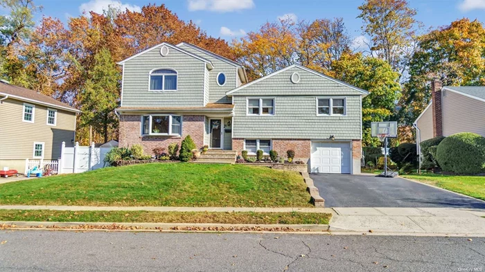 Welcome home! This expanded split features 5 bedrooms and 3 full baths!! Updated kitchen with open concept into the dining room. Nice size living room and den plus a finished basement! This home also has cac, updated electric, hardwood floors , inground sprinklers and a one and a half size attached garage! Bethpage school District! Kramer Lane Elementary.