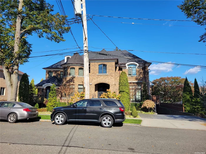 This exquisite 2019 custom-built brick center hall colonial offers the perfect blend of luxury, comfort, and modern design. Spanning an impressive 8, 000 sq. ft. of total space, this home features 5 spacious bedrooms and 6.5 bathrooms, providing ample room for family and guests. The main level boasts an open-concept layout with soaring high ceilings and radiant heated floors throughout, ensuring warmth and elegance in every room. The gourmet kitchen is a chef&rsquo;s dream, with top-of-the-line appliances, custom cabinetry, and beautiful finishes, ideal for both everyday living and entertaining. No detail has been overlooked, from the custom millwork to the expansive windows that flood the home with natural light. The home&rsquo;s impressive outdoor space includes a luxurious inground pool surrounded by meticulously landscaped grounds, perfect for relaxation or hosting gatherings. A fully finished 3, 000 sqft. basement with 9 ft ceiling offers additional living space, ready to be transformed into a home theater, gym, or entertainment area. With a radiant floor garage and heated driveway, this home is designed to offer comfort year-round, no matter the season. Located in a prime neighborhood, this home is a rare find-an architectural masterpiece designed for those who appreciate the finest in craftsmanship and modern luxury living.