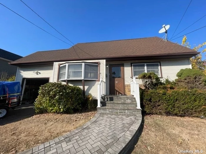 Estate Sale!! Being sold as is No CO for rear deck or awning. Exterior is in good shape. Interior needs paint and spackle. Hardwood floors under the carpets. Brand new gas Boiler, Updated Gas hot water heater and Electric service!