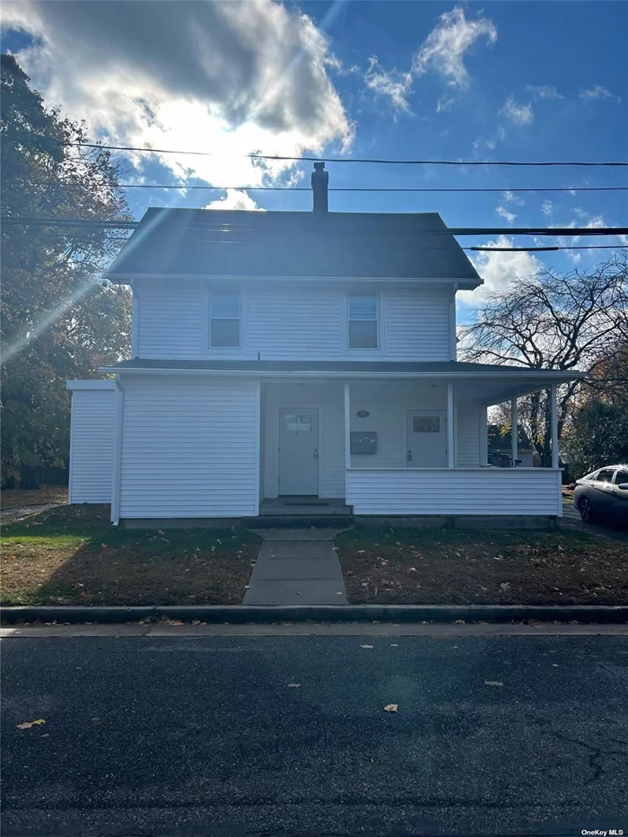 Legal 4 unit apartment building. Conveniently located close to train, bus, and shopping. New vinyl siding and insulation, partial new roof, and new cesspool from 2016 recently serviced in November, Each unit has its own electrical meter, boiler, and hot water heater.