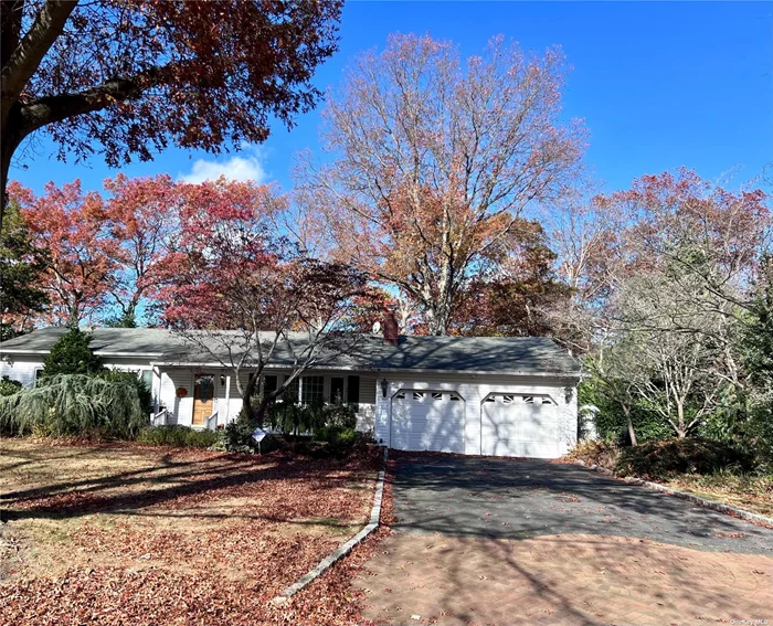 Location Location! Magnificent?expanded ranch located in the Smithtown school?district. Keep it as is or renovate it to the home of your dreams! Situated on a half acre on a picturesque tree lined street. This home is bigger than it looks & ready for immediate occupancy! Curb Appeal at its finest! Mature landscaping worth admiring!? Enter through a long covered front porch with beautiful bluestone pavers into a?large living room with a cozy wood burning fireplace. A true eat-in-kitchen?has?room for a full table with a walk out to the backyard patio. 3 bedrooms, one of which?is an ensuite with full bathroom and walk-in-closet. Other features include hardwood?floors, formal dining room, large den, 2 car garage with tons of storage, full unfinished basement, central air, separate?hot water?heater, alarm ready and so much more! Come see it for yourself?and envision the?extraordinary opportunity!?